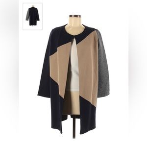 Woman’s Medium Ann Taylor coat/cardigan. Never worn. Condition is still new.